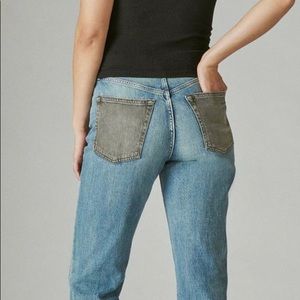 Lucky Brand | High Rise Distressed Jeans with Black Denim Pockets